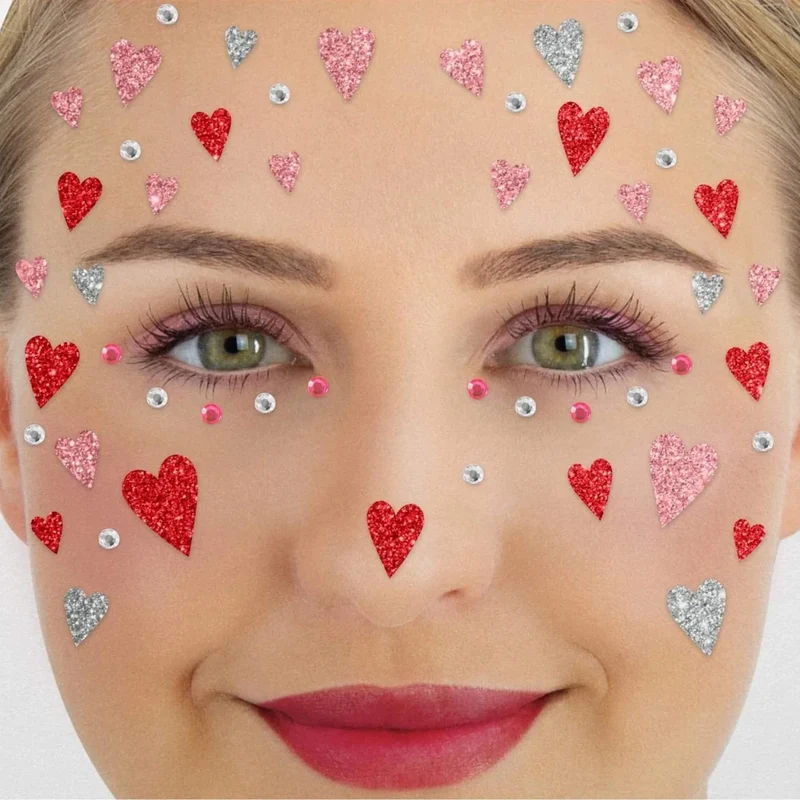 Rote, rosa, künstliche Tattoos für das Gesicht mit Glitzer und Herzchen