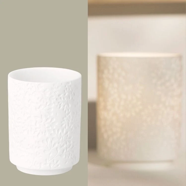Räder Wunderblätter Vase Zweige
