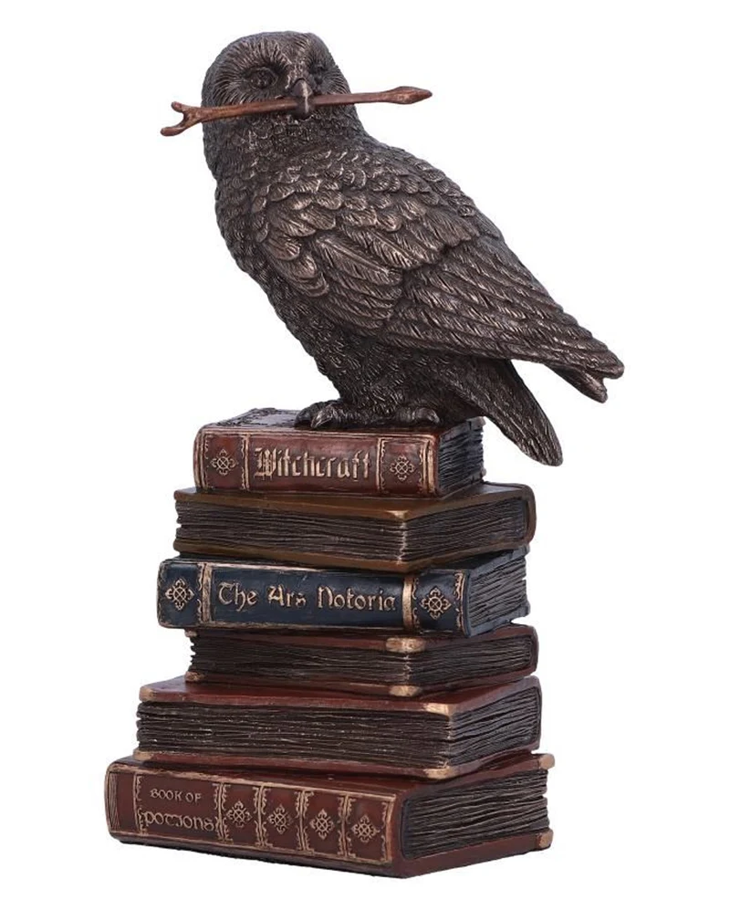 Zaubernde Eule auf Bücherstapel 14cm
