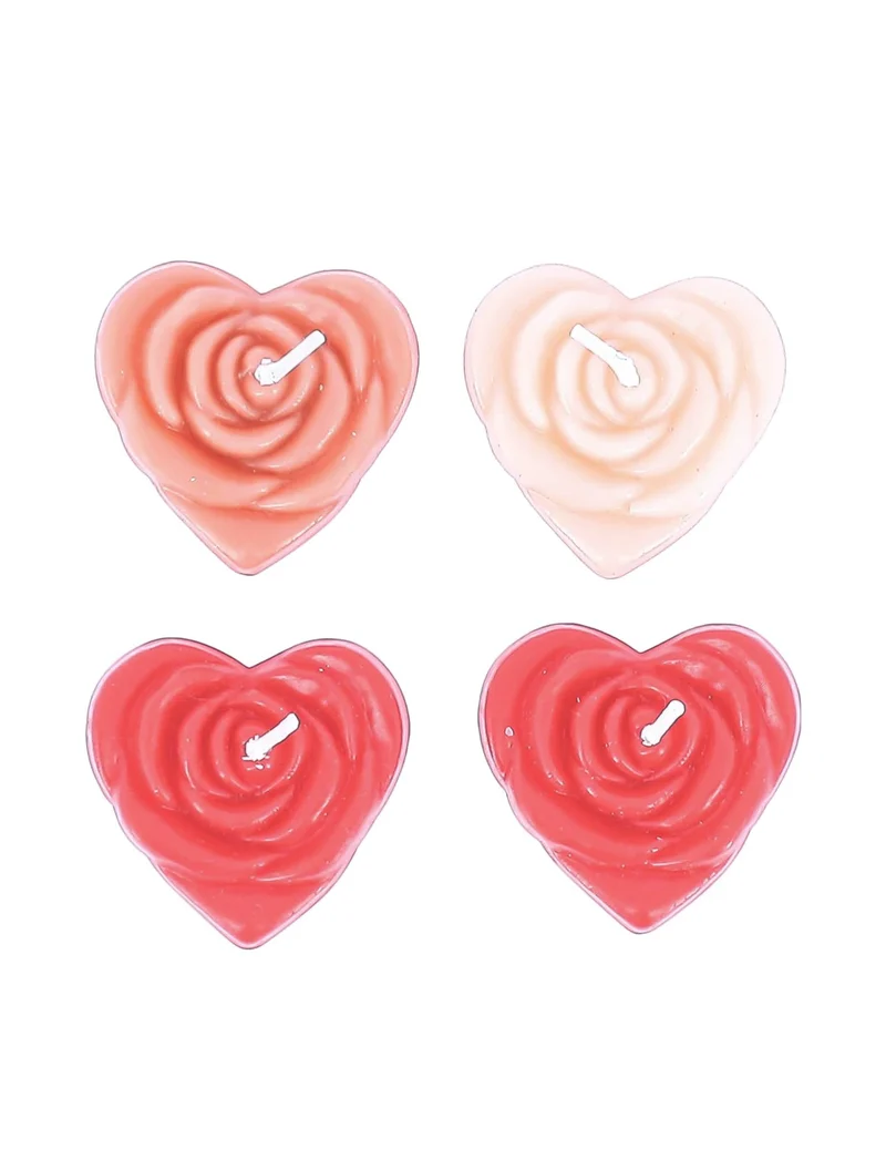 4 pastellrosa Herzkerzen
