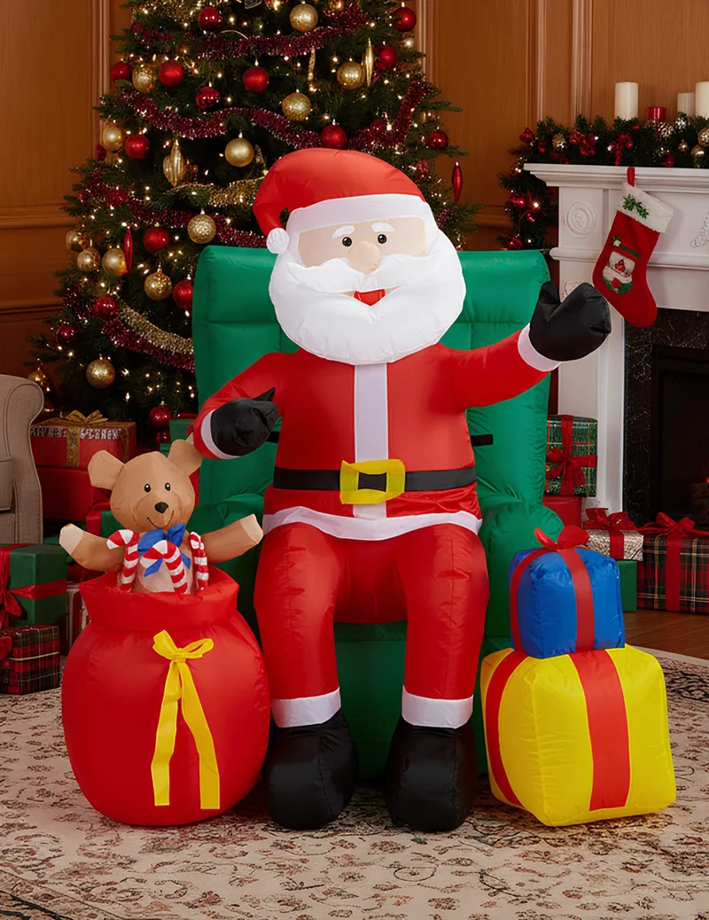 Animierte aufblasbare Dekoration Weihnachtsmann sitzend mit Geschenken 122 cm